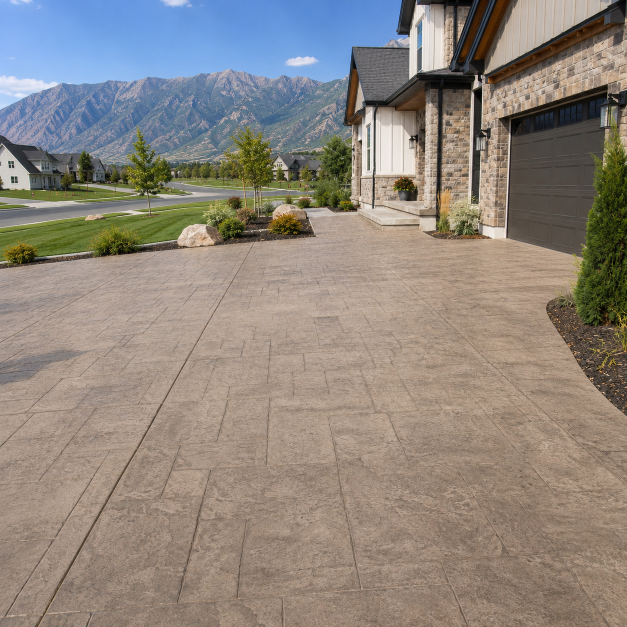 Decorative concrete driveway with stamped or scored finish in northern Utah